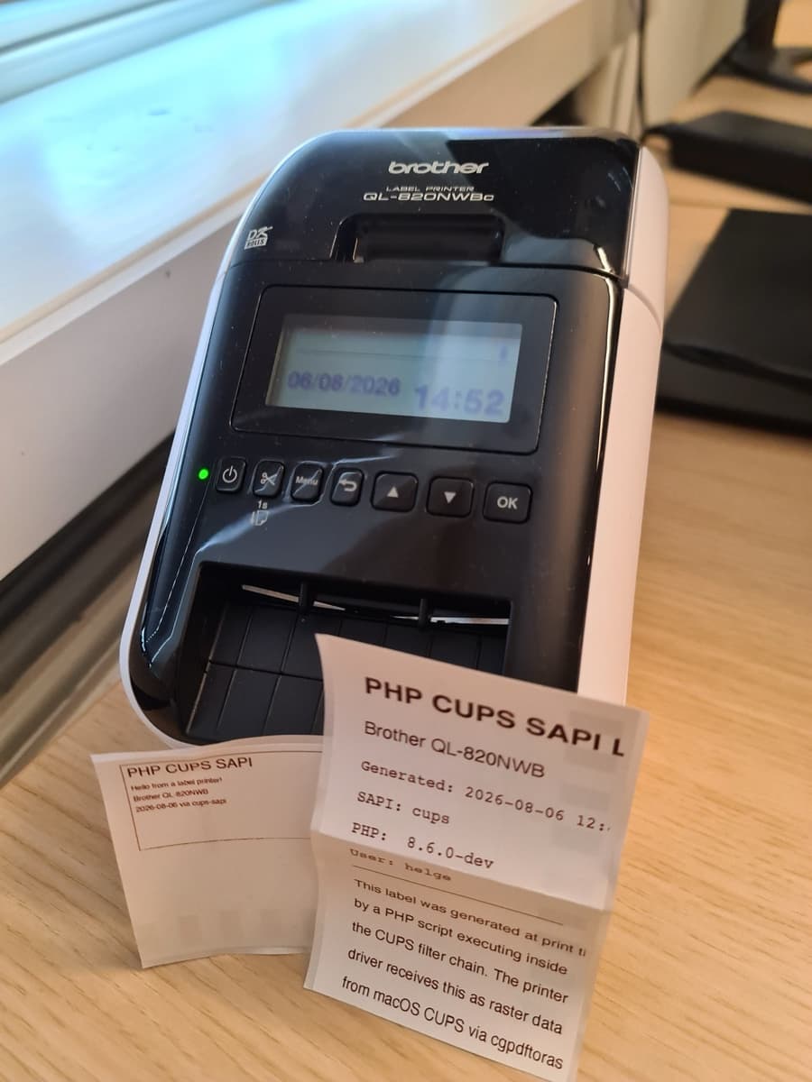 Brother QL-820NWB label printer with stickers generated at runtime by a PHP script executing inside the CUPS filter chain